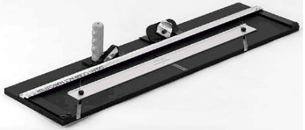 Figure K-3: The Logan Compact Cutter provides a fixed guide rail and built-in measuring system.